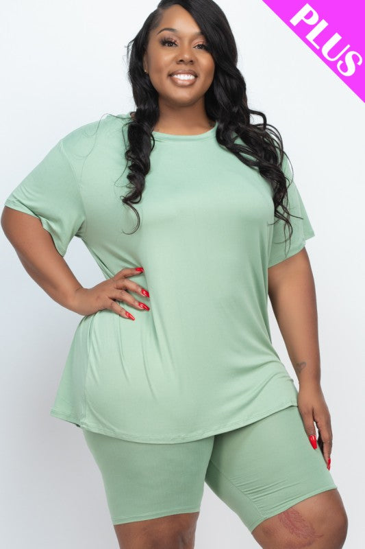 Woman wearing a light green outfit with 'PLUS' text on a white background