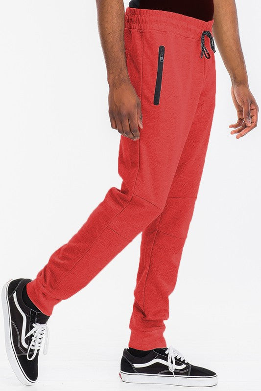 Indulge in comfort with TONY JOGGERS for men. Perfect fit, adjustable drawstring, zippered pocket, and elastic ankle cuff. Designed with a luxurious blend of cotton, polyester, and spandex for comfort and durability.