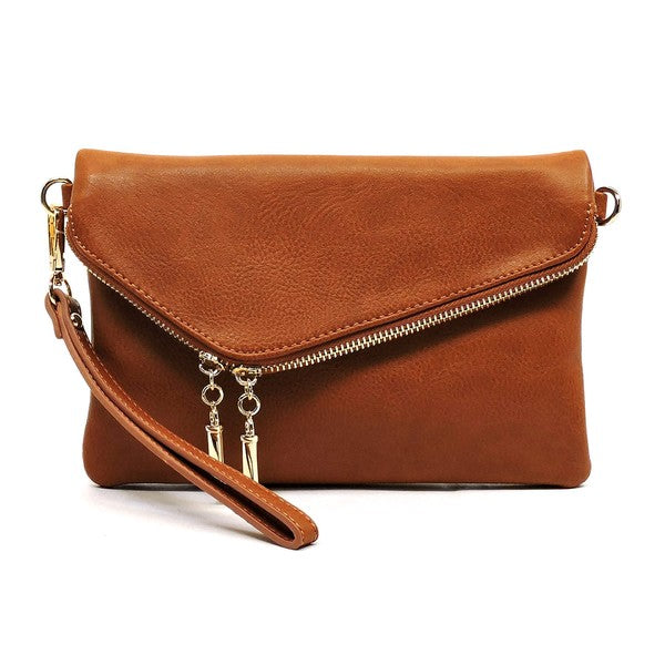 Brown fold-over clutch purse accented with gold tone hardware.