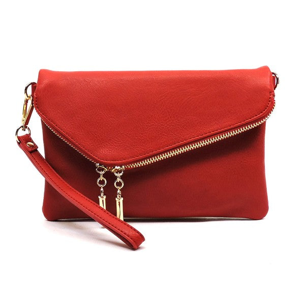 Red fold-over clutch purse accented with gold tone hardware.