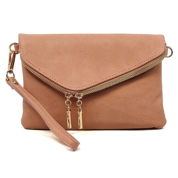 Nude fold-over clutch purse accented with gold tone hardware.