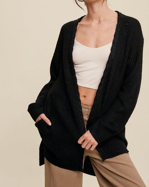 This Lorna Cable Knit Open Front Long Cardigan provides warmth and style with its long sleeves and zip top closure. Made from 78% nylon and 22% spandex, it offers both comfort and stretch. Perfect for lounging in luxurious loungewear.