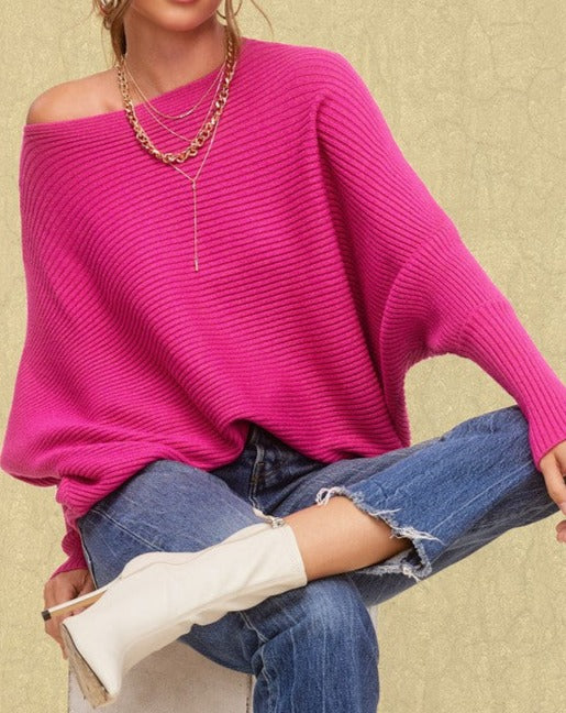 This versatile sweater is perfect for layering or wearing on its own. It is a must-have addition to any sweater collection, made with a ribbed knit fabric and featuring a boat neckline and slouchy bubble sleeves. For a comfortable yet stunning look, it can also be worn off the shoulder.