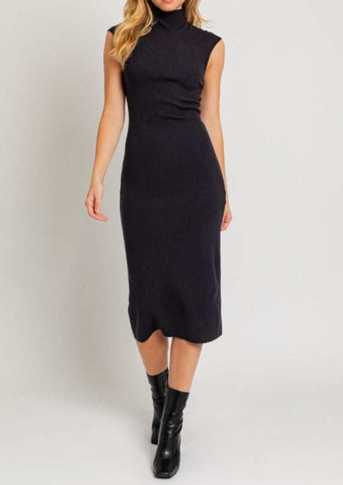 Effortlessly chic and endlessly versatile, our Mock Neck Sweater Midi Dress is the epitome of cozy sophistication. The mock neck adds a touch of elegance, while the midi length provides a flattering silhouette. Perfect for any occasion, this sweater dress seamlessly transitions from day to night.