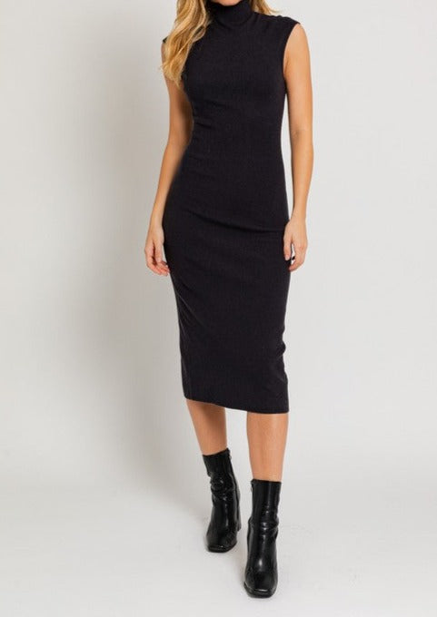 Effortlessly chic and endlessly versatile, our Mock Neck Sweater Midi Dress is the epitome of cozy sophistication. The mock neck adds a touch of elegance, while the midi length provides a flattering silhouette. Perfect for any occasion, this sweater dress seamlessly transitions from day to night.