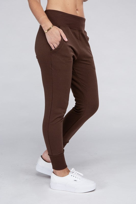 These must-have Comfy Stretch Lounge Sweat Pants are the perfect loungewear option. Their soft and stretchy fabric provides unparalleled comfort while the elastic waistband ensures a secure and flexible fit. Whether you're relaxing at home or running errands, these pants will keep you comfortable and stylish.