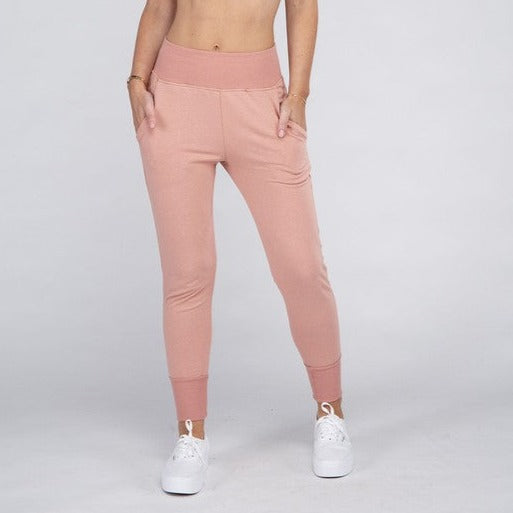 These must-have Comfy Stretch Lounge Sweat Pants are the perfect loungewear option. Their soft and stretchy fabric provides unparalleled comfort while the elastic waistband ensures a secure and flexible fit. Whether you're relaxing at home or running errands, these pants will keep you comfortable and stylish.