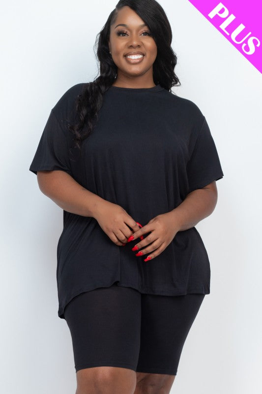 Woman wearing a black outfit with 'PLUS' text on a white background