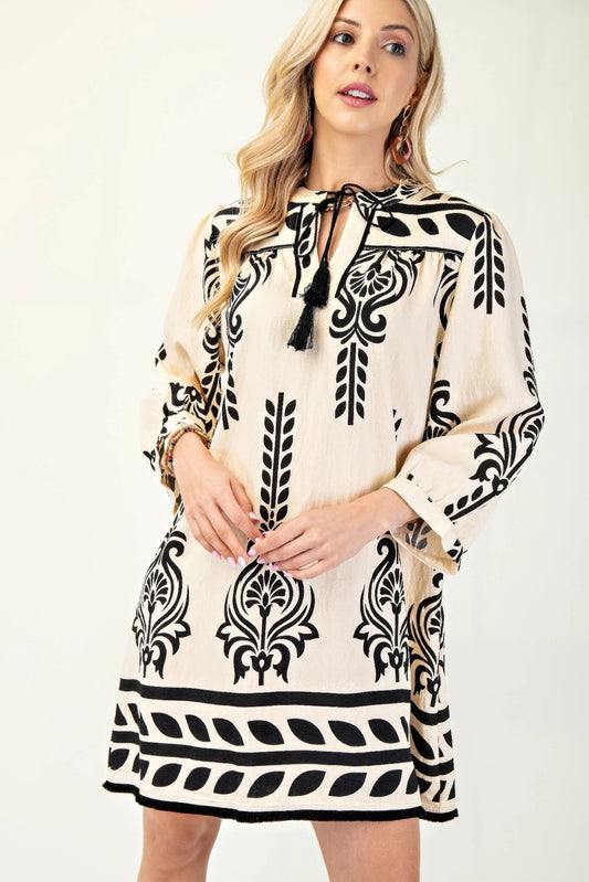 Cream with black flowy print dress