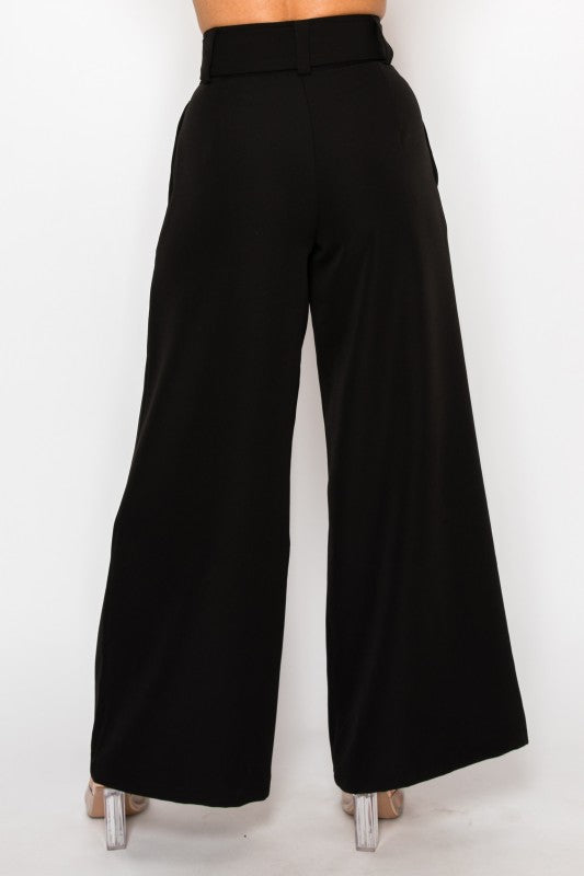 Black wide-leg pants on a white background