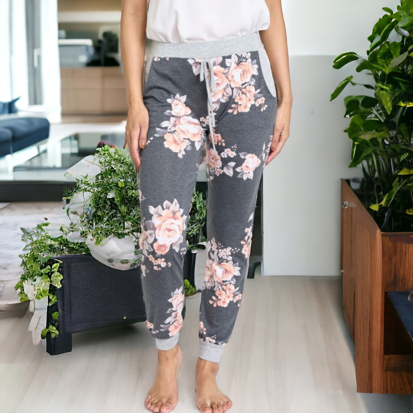 Elevate your style with our Floral Drawstring Jogger! Featuring a beautiful floral pattern, comfortable fit, and drawstring waist, you'll feel effortlessly chic all day. A must-have for any fashion-forward individual!