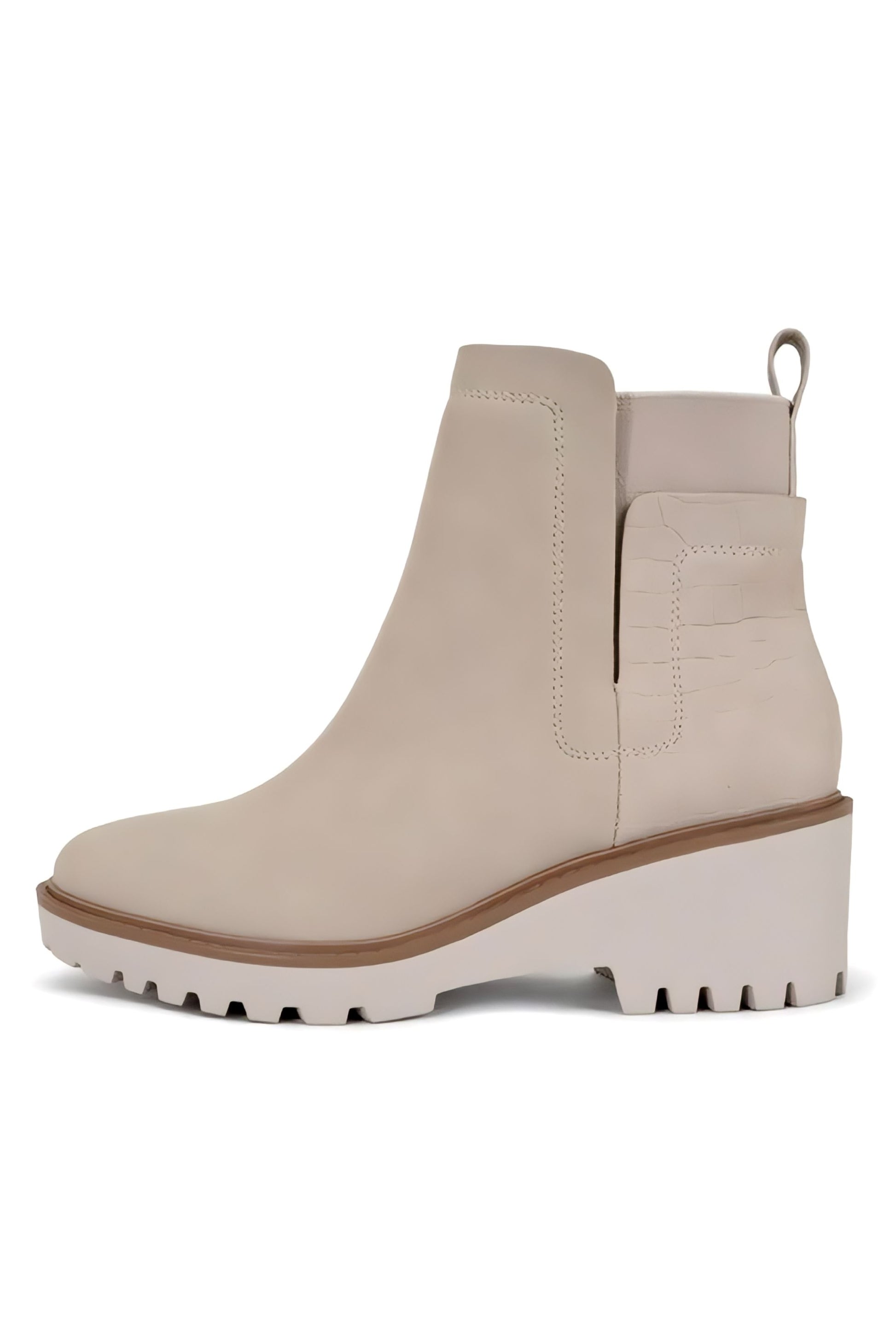 The KARA BOOTIE is a stylish and versatile slip-on bootie, perfect for casual wear. With its high top design, it offers both comfort and fashion-forward style. Whether you're running errands or hanging out with friends, the KARA BOOTIE is a must-have addition to your wardrobe.