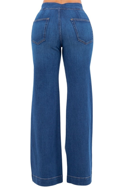 Blue jeans shown from the back on a white background