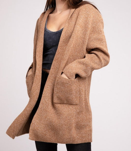 Hooded Open Front Sweater Cardigan, the perfect combination of comfort and fashion. Made with a soft and cozy knit, this cardigan has an open front for easy layering. The attached hood adds casual sophistication, and the front pockets add style and convenience.