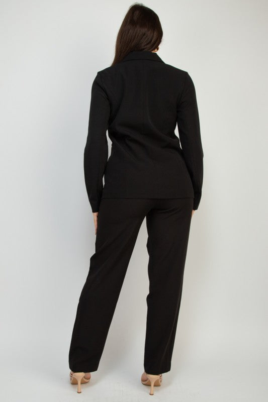 Person wearing a black suit on a white background