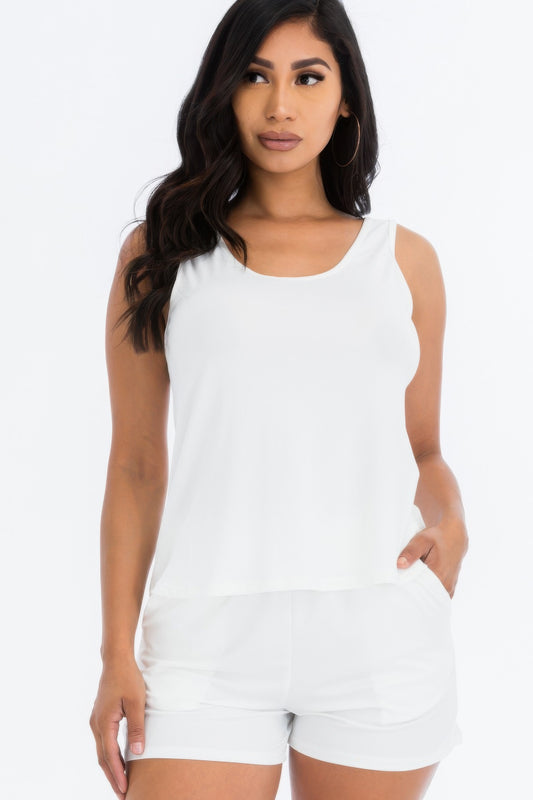 White long tank top and shorts set made from soft, high-stretch jersey fabric.
