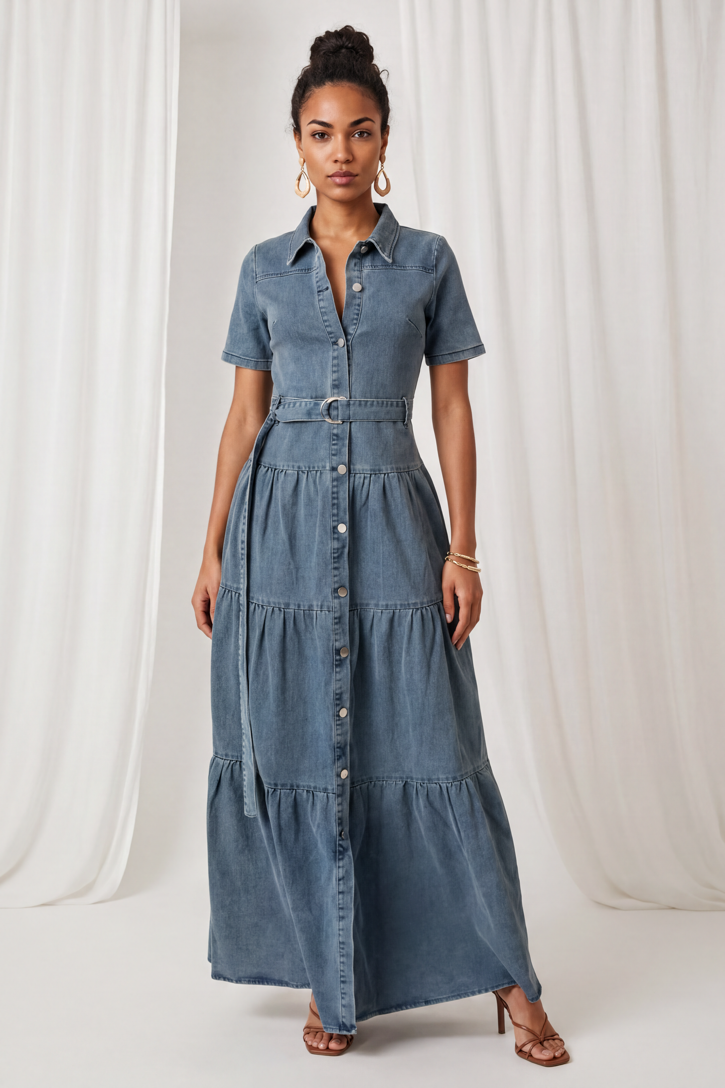 Amora Denim Maxi Dress featuring a button-front design, short sleeves, and adjustable waist belt.