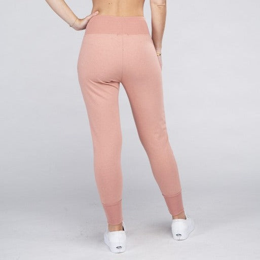 These must-have Comfy Stretch Lounge Sweat Pants are the perfect loungewear option. Their soft and stretchy fabric provides unparalleled comfort while the elastic waistband ensures a secure and flexible fit. Whether you're relaxing at home or running errands, these pants will keep you comfortable and stylish.