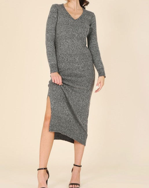 Expertly crafted in a cozy mélange print, this maxi dress features fitted silhouette and a classic V-neckline. The long sleeve design is complemented by a stylish side slit and a pullover closure. Perfect for any occasion, this dress boasts a professional and informative style with no lining for ultimate casual look.