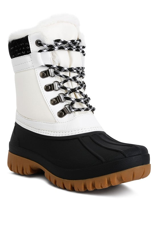 Constructed with TPR outer sole and faux leather outer material, these ankle length boots feature a closed rounded toe, lace up closure, and fur lining collar and tongue. The knitted and eyelet details add a stylish touch, while the lightly cushioned insoles provide comfort with every step. 