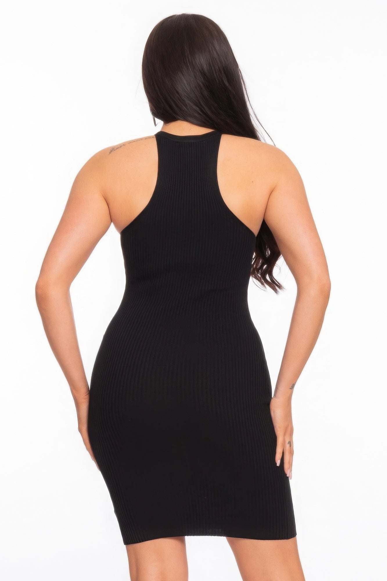 With a blend of 81% Rayon and 19% Nylon, this sleeveless dress features a variegated rib pattern for a modern and chic look. Its classic and timeless Black shade adds a sleek and versatile appearance while providing a comfortable and stretchy fit. Experience a stylish and contemporary touch with the variegated rib pattern, and a comfortable and figure-flattering fit with the blend of Rayon and Nylon - suited for any occasion.