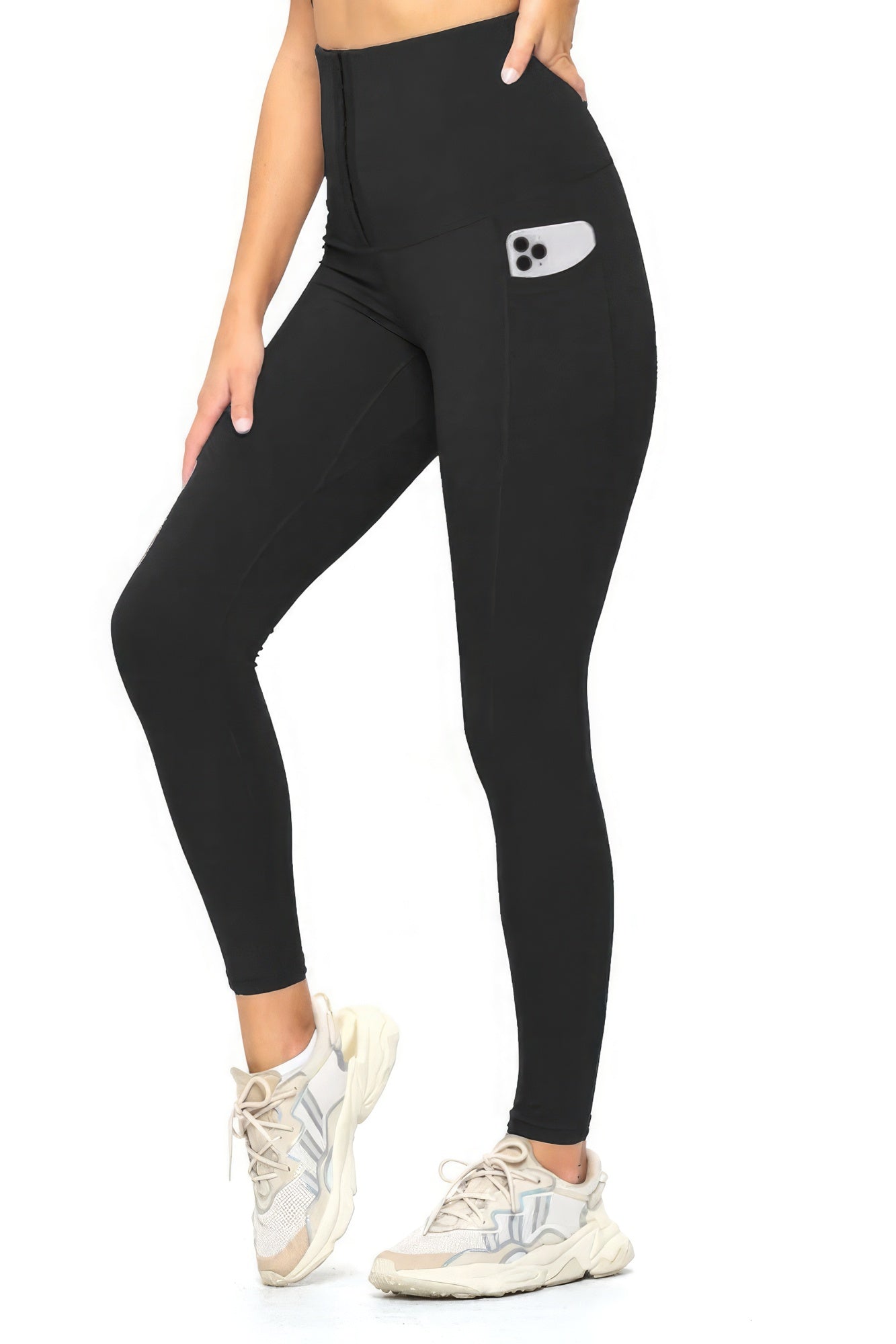 Enhance your yoga routine with our Black Body Shaper Fashion Yoga Legging. This versatile legging comes in sizes S, M, L, and XL, and boasts a wide waistband with a three-hook closure for increased tummy compression and a natural, slim look. The leggings also feature convenient side pockets for your cellphone during workouts.