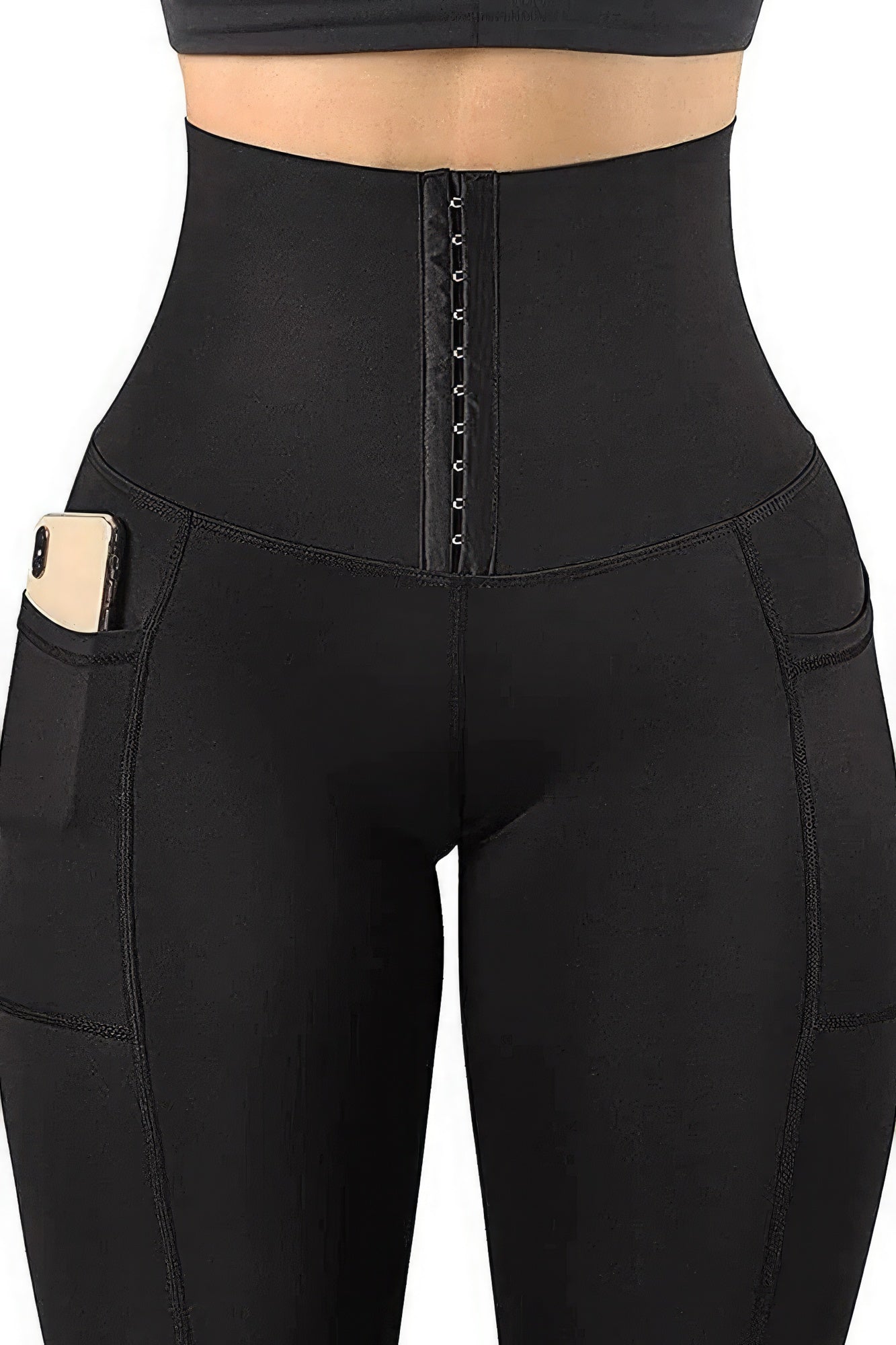 Enhance your yoga routine with our Black Body Shaper Fashion Yoga Legging. This versatile legging comes in sizes S, M, L, and XL, and boasts a wide waistband with a three-hook closure for increased tummy compression and a natural, slim look. The leggings also feature convenient side pockets for your cellphone during workouts.